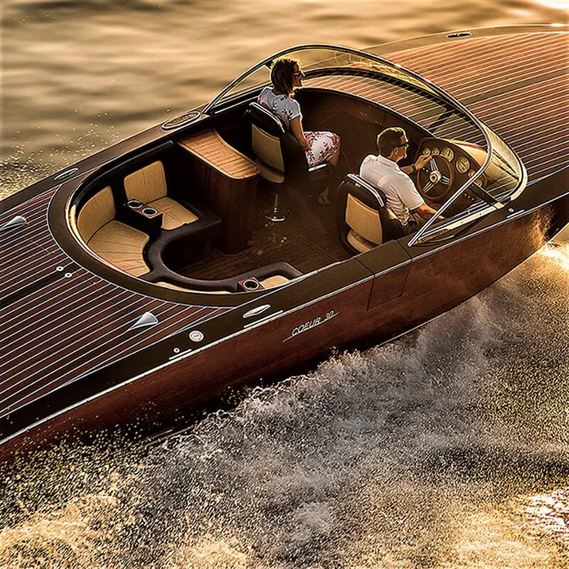 People enjoying a ride in luxury speedboat.