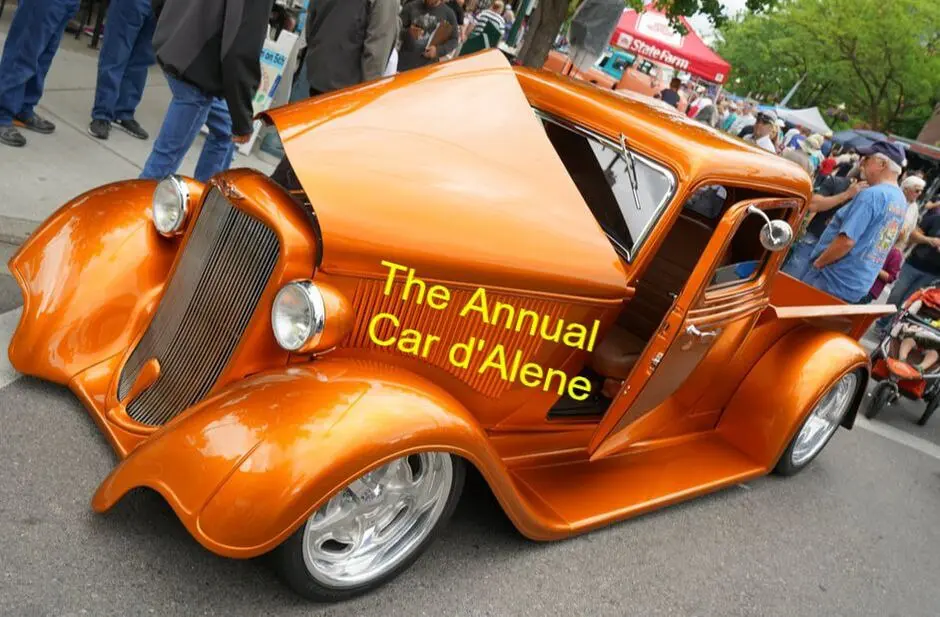 Orange vintage car at Car d'Alene event.