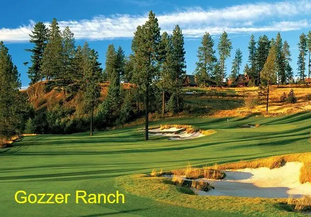 Golf course with trees and sand traps.