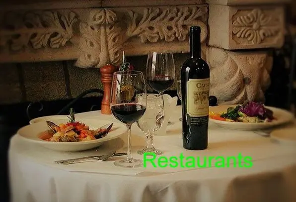 Wine and dinner setting at a restaurant.